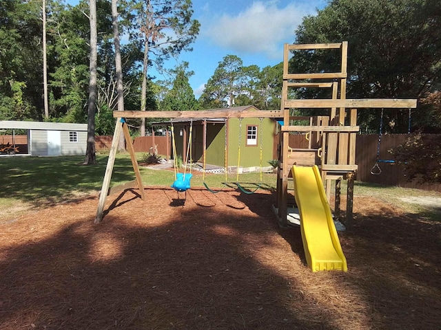 88 Wildwood Dr, Crawfordville, FL 32327 - view of playground featuring a storage unit