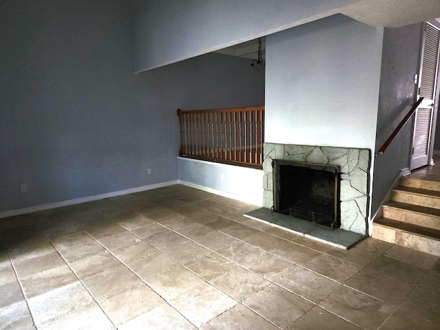 unfurnished living room featuring a fireplace