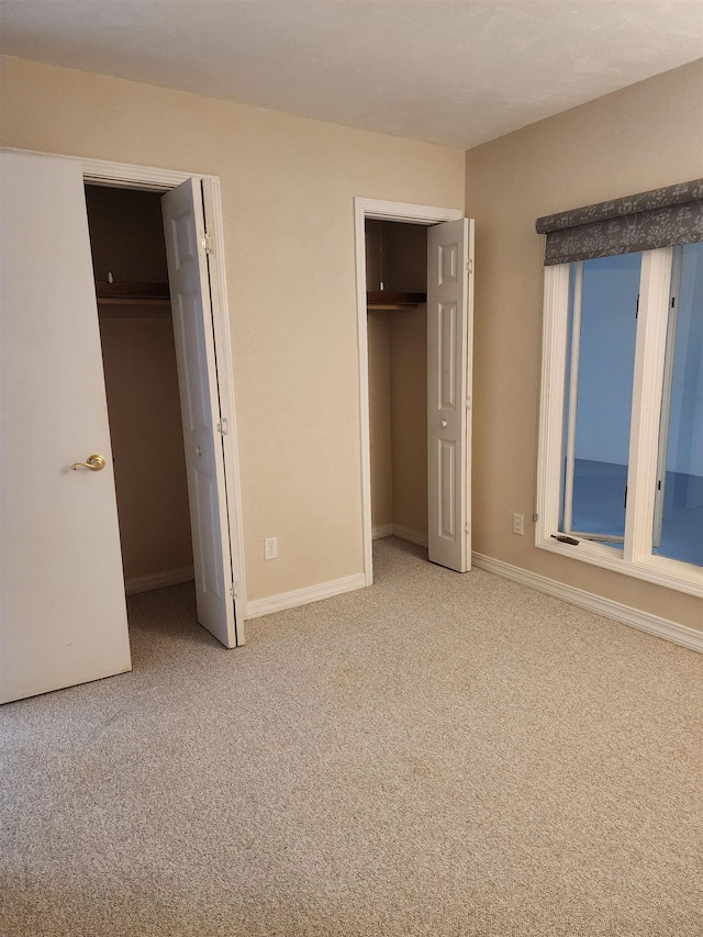 unfurnished bedroom with carpet