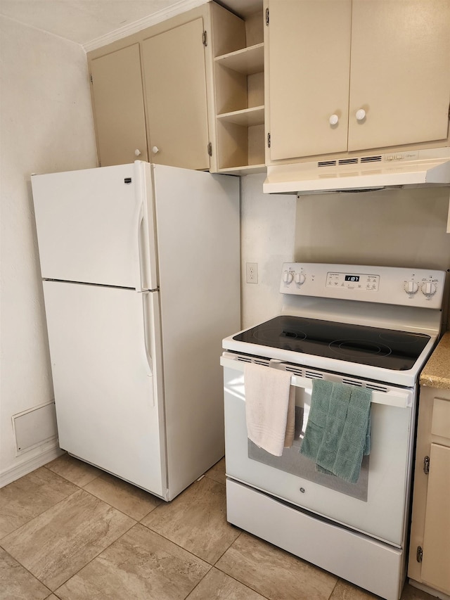 kitchen with white appliances and cream cabinetry