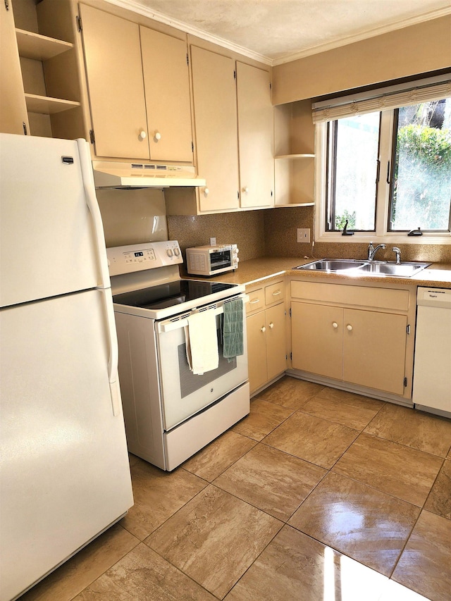 kitchen with tasteful backsplash, sink, white appliances, ornamental molding, and cream cabinetry