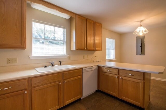 kitchen featuring sink, kitchen peninsula, white dishwasher, decorative light fixtures, and electric panel