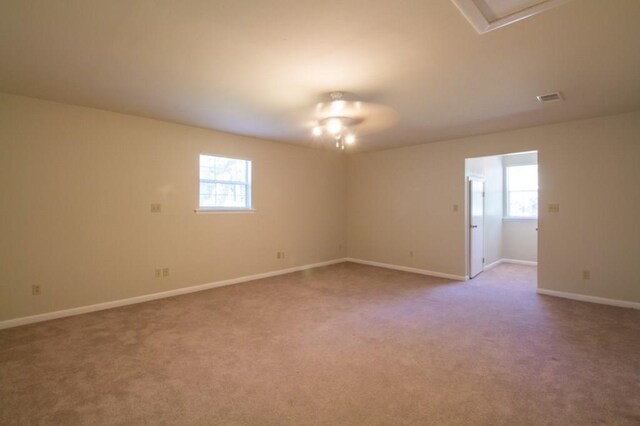 empty room featuring carpet flooring