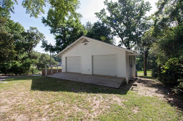 garage with a lawn