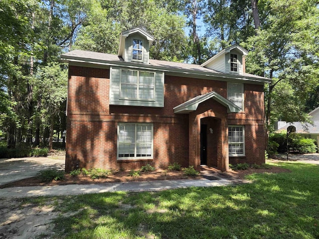 9369 Buck Haven Trl, Tallahassee, FL 32312 - view of front of property with a front lawn and brick siding