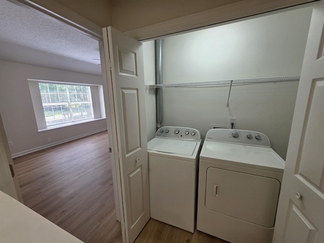 9369 Buck Haven Trl, Tallahassee, FL 32312 - washroom featuring independent washer and dryer and wood finished floors