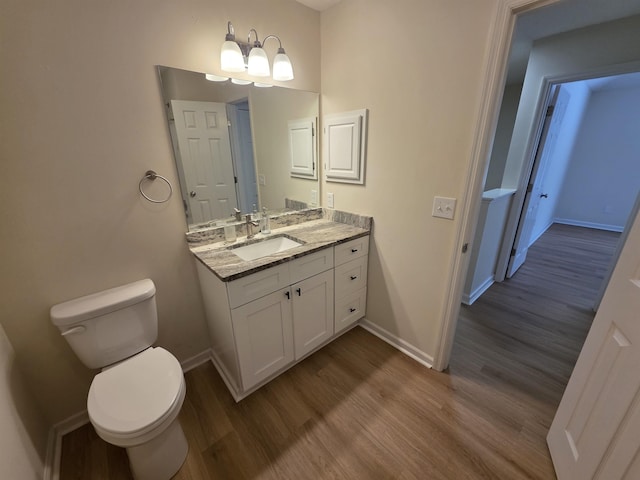 9369 Buck Haven Trl, Tallahassee, FL 32312 - bathroom with wood finished floors and vanity