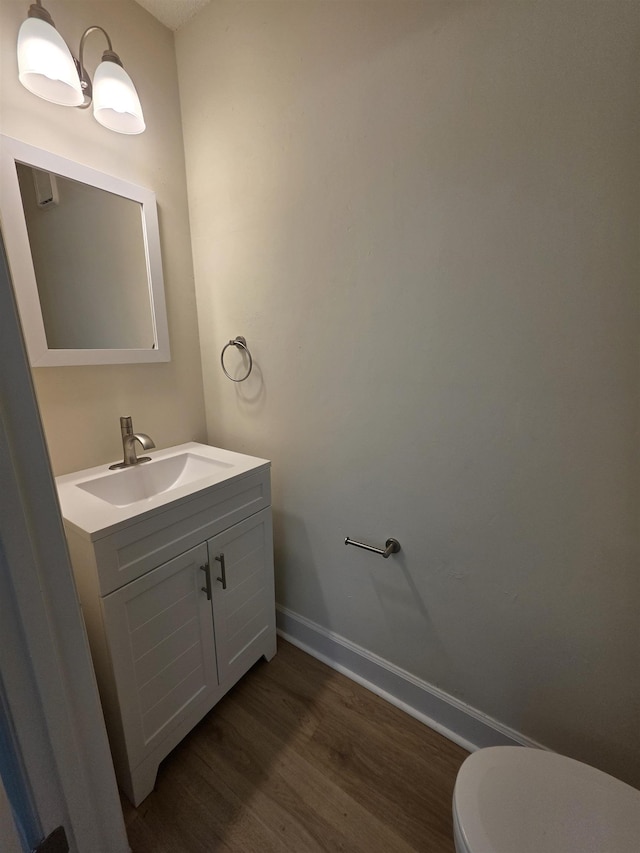 9369 Buck Haven Trl, Tallahassee, FL 32312 - half bathroom featuring wood finished floors and vanity
