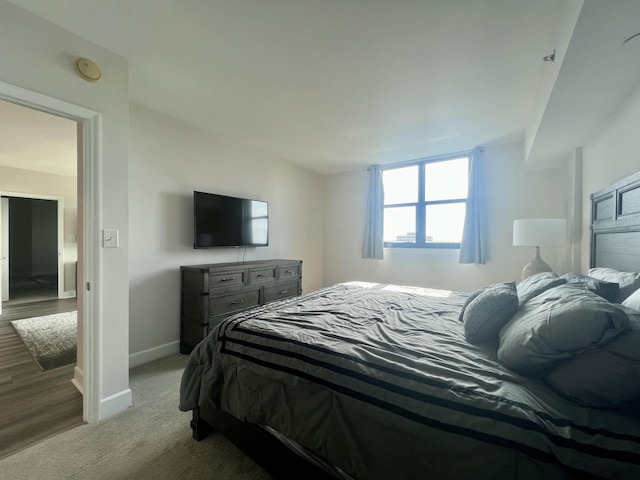 300 S Duval St Unit 1602, Tallahassee, FL 32301 - bedroom featuring baseboards and carpet