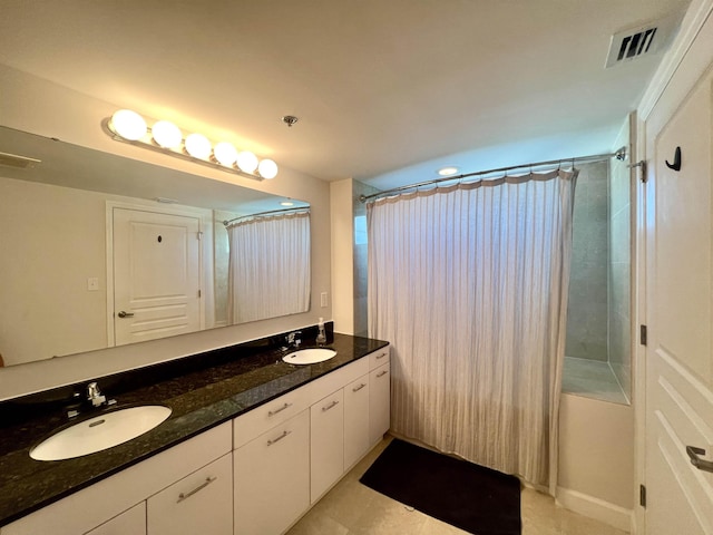 300 S Duval St Unit 1602, Tallahassee, FL 32301 - full bath featuring double vanity, shower / tub combo, and tile patterned floors