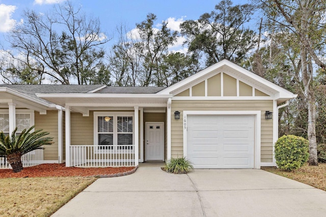 single story home with a garage and a porch