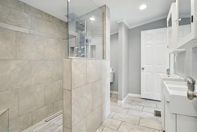 802 N Quincy St, Perry, FL 32347 - bathroom featuring ornamental molding, a walk in shower, double vanity, baseboards, and recessed lighting