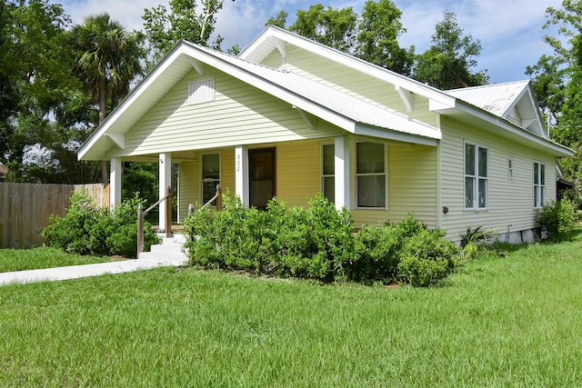 802 N Quincy St, Perry, FL 32347 - view of front of property featuring covered porch and metal roof