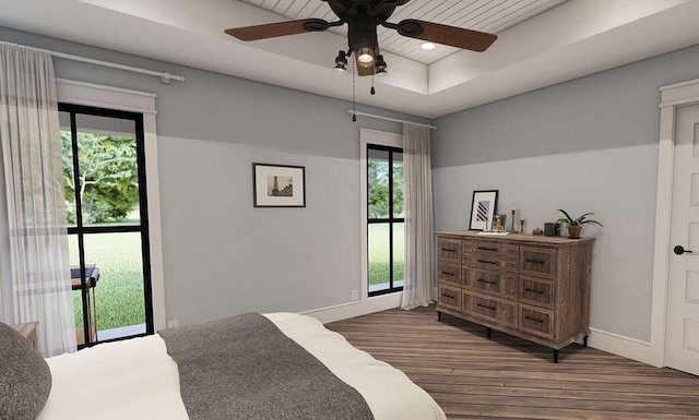 947 Cap Tram Rd, Tallahassee, FL 32317 - bedroom with wood finished floors, a raised ceiling, recessed lighting, and a ceiling fan