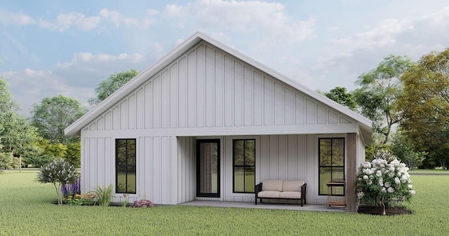 947 Cap Tram Rd, Tallahassee, FL 32317 - rear view of property featuring a yard and board and batten siding