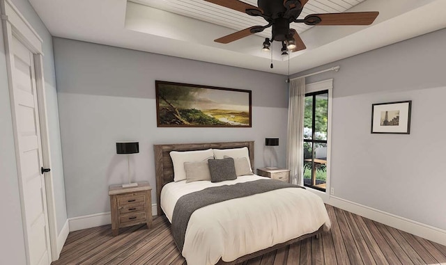947 Cap Tram Rd, Tallahassee, FL 32317 - bedroom with ceiling fan, access to outside, wood finished floors, and a raised ceiling