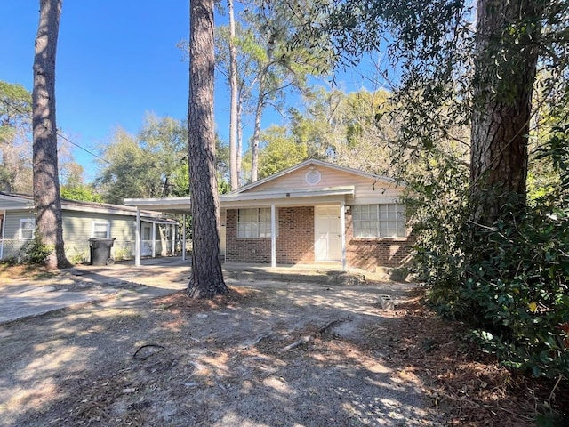 view of front facade with a carport