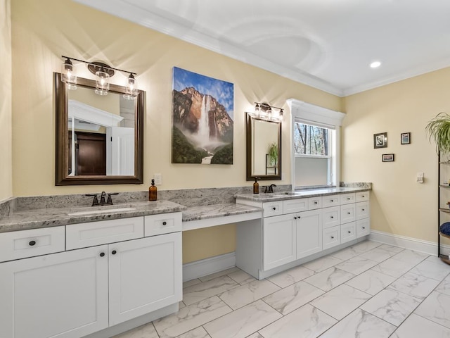 bathroom featuring ornamental molding and vanity