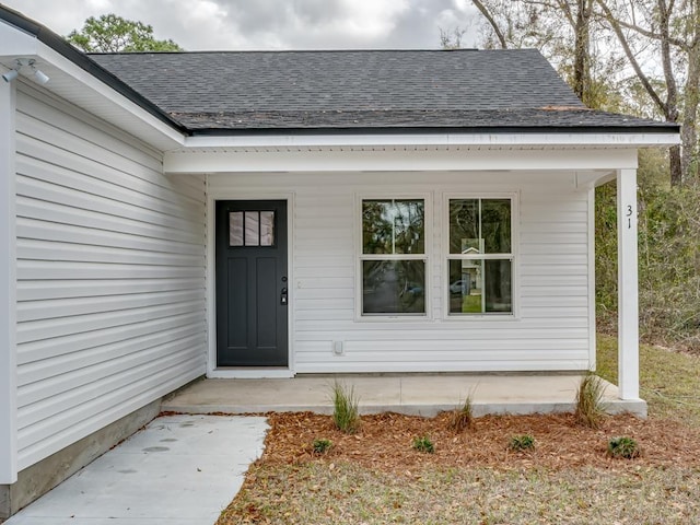 17 Broken Bow Trl, Crawfordville, FL 32327 - property entrance with roof with shingles