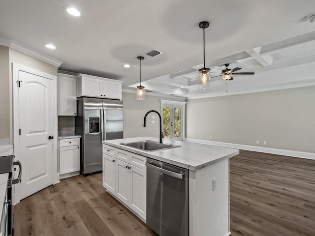 17 Broken Bow Trl, Crawfordville, FL 32327 - kitchen with appliances with stainless steel finishes, crown molding, a sink, recessed lighting, and dark wood-type flooring