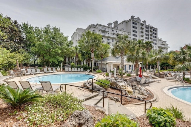 view of swimming pool with a patio area