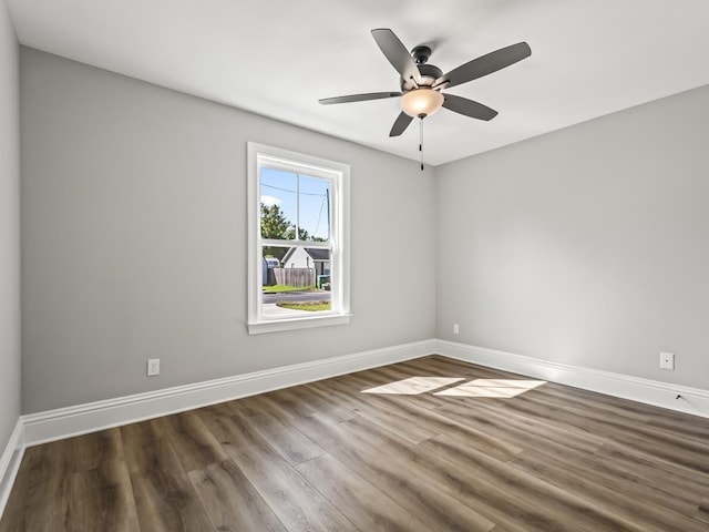 unfurnished room featuring ceiling fan and wood-type flooring