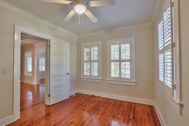 837 E Park Ave, Tallahassee, FL 32301 - unfurnished room featuring ceiling fan, hardwood / wood-style floors, and ornamental molding
