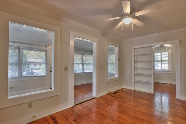 837 E Park Ave, Tallahassee, FL 32301 - interior space featuring crown molding, ceiling fan, plenty of natural light, and wood-type flooring