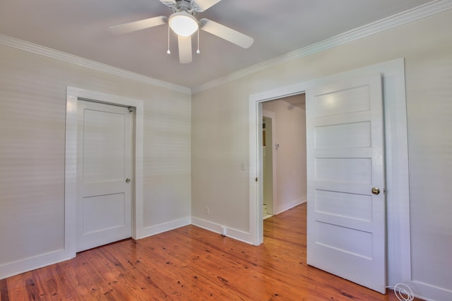 837 E Park Ave, Tallahassee, FL 32301 - spare room with ceiling fan, wood-type flooring, and ornamental molding