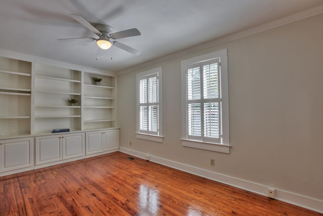 837 E Park Ave, Tallahassee, FL 32301 - empty room featuring ceiling fan, ornamental molding, and light hardwood / wood-style flooring