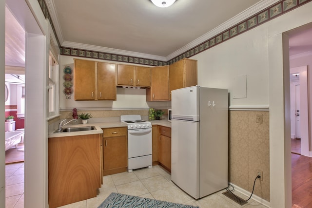 837 E Park Ave, Tallahassee, FL 32301 - kitchen featuring light tile patterned floors, white appliances, crown molding, and sink
