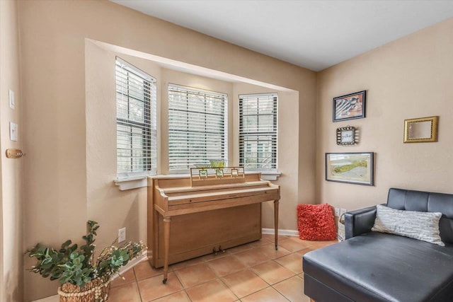 sitting room featuring light tile patterned floors