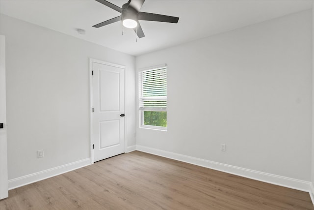2224 Keith St, Tallahassee, FL 32310 - empty room with light wood-style flooring, ceiling fan, and a smoke detector