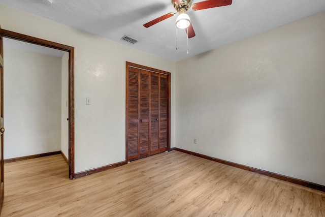2104 Alton Rd, Tallahassee, FL 32303 - unfurnished bedroom featuring light wood-type flooring, a closet, baseboards, and ceiling fan