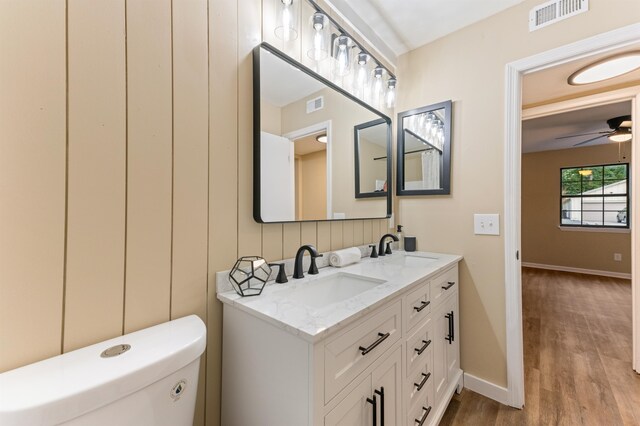 2053 Ted Hines Dr, Tallahassee, FL 32308 - bathroom featuring double vanity, wood finished floors, and a ceiling fan
