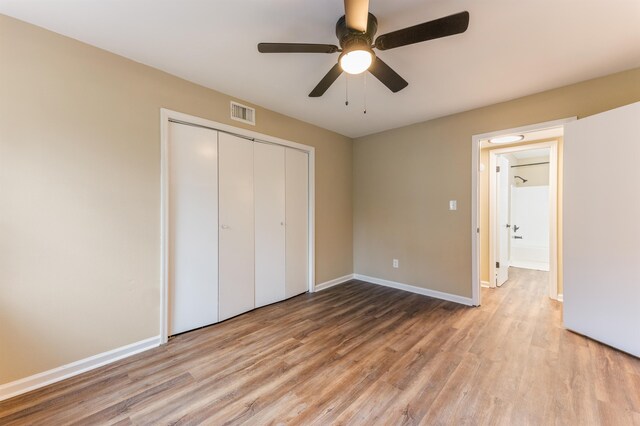 2053 Ted Hines Dr, Tallahassee, FL 32308 - unfurnished bedroom with wood finished floors, a closet, and ceiling fan