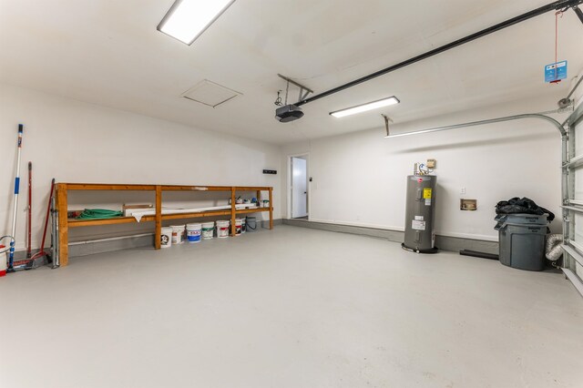 2053 Ted Hines Dr, Tallahassee, FL 32308 - garage featuring electric water heater and a garage door opener