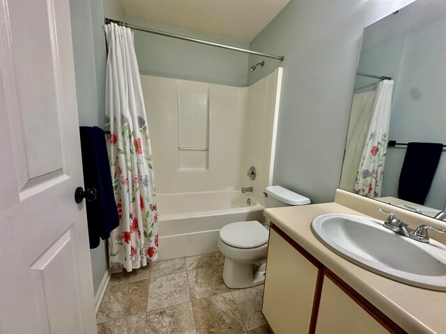 full bathroom with toilet, vanity, and shower / bathtub combination with curtain