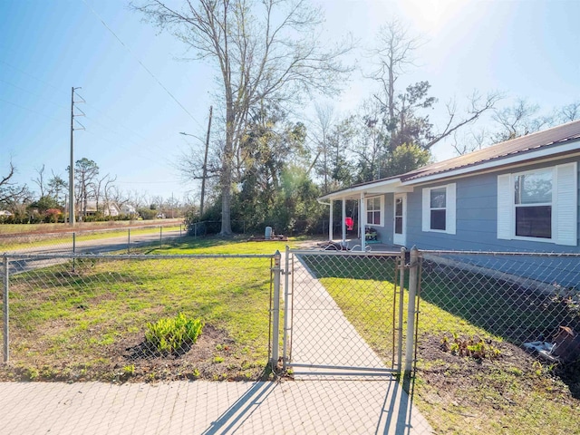 view of yard with a gate and fence