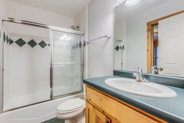 220 Deer Pass, Havana, FL 32333 - full bathroom featuring toilet, bath / shower combo with glass door, and vanity