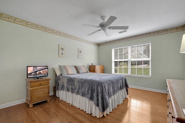 bedroom featuring ceiling fan and light wood-type flooring