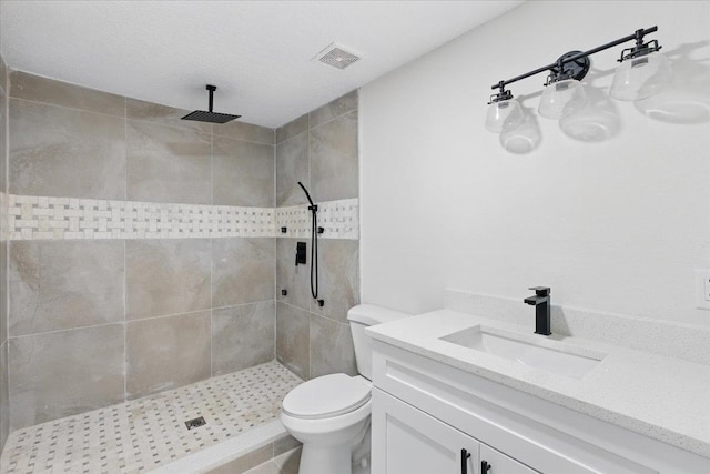 1822 N US-221, Perry, FL 32347 - full bath featuring vanity, toilet, tiled shower, and visible vents