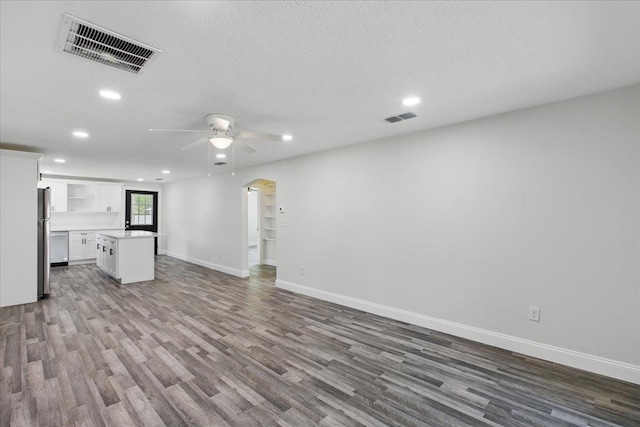 1822 N US-221, Perry, FL 32347 - unfurnished living room with a ceiling fan, visible vents, wood finished floors, and recessed lighting