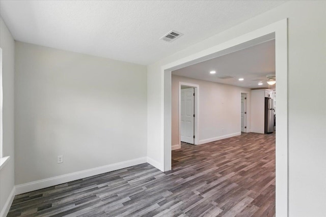 1822 N US-221, Perry, FL 32347 - spare room featuring a ceiling fan, visible vents, wood finished floors, baseboards, and recessed lighting