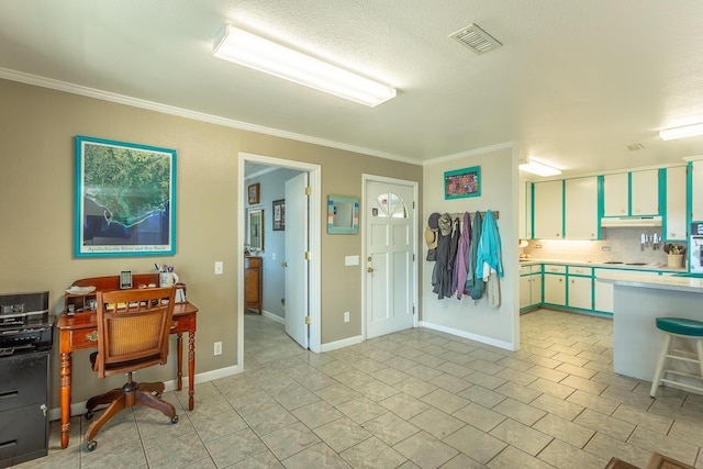 kitchen with white oven and crown molding