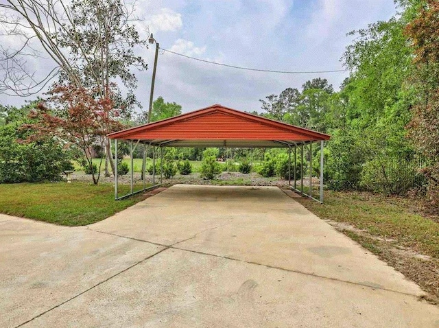 view of parking with a carport and a yard