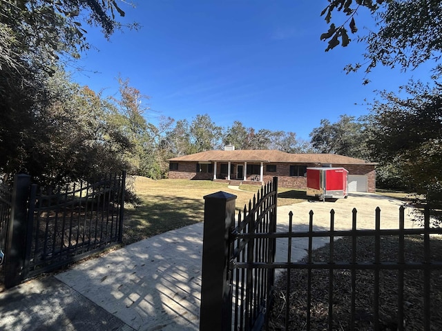 view of front of home with a front lawn