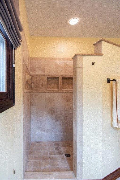 bathroom with a shower