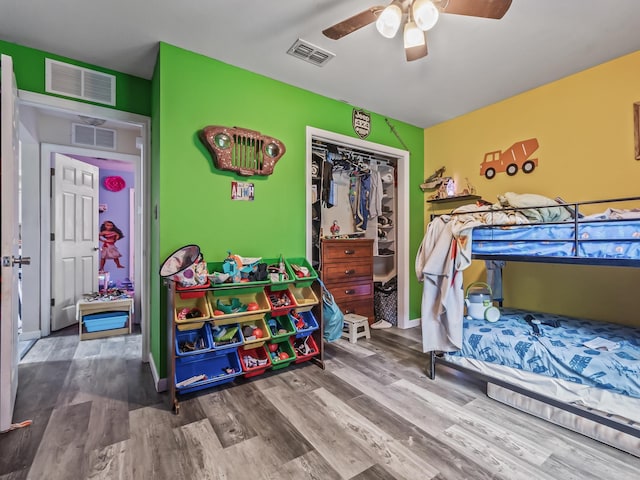 172 Mohave Rd, Crawfordville, FL 32327 - bedroom featuring wood finished floors, a ceiling fan, and a closet
