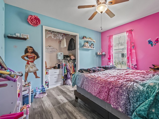 172 Mohave Rd, Crawfordville, FL 32327 - bedroom with a closet, wood finished floors, and a ceiling fan